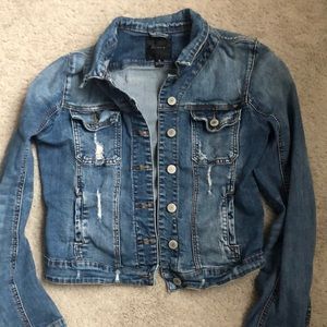 Distressed denim jacket